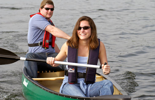 Couple Paddling Canoe