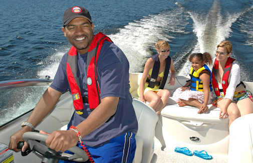 Family In Boat Underway