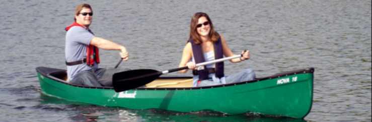 Couple Paddling Canoe